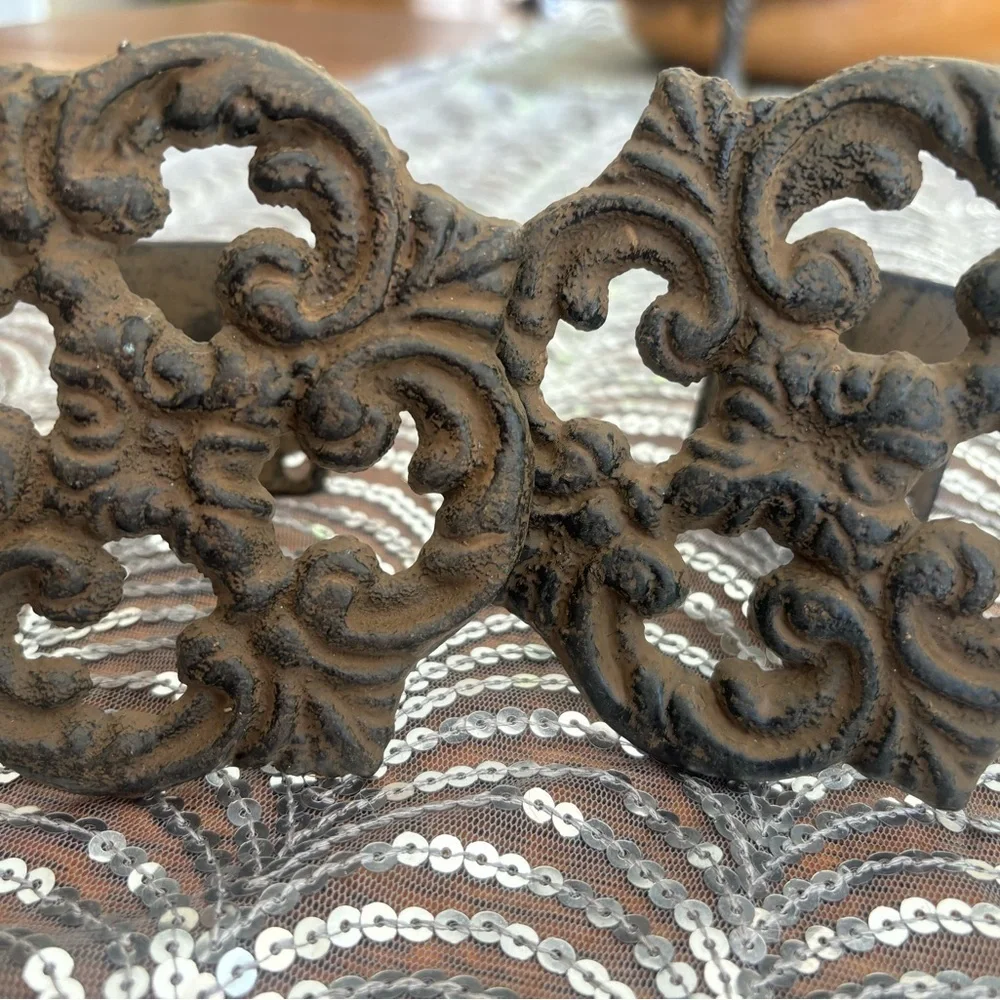 Antique cast iron curtain accents